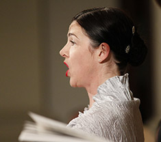 Clare performing at the requiem